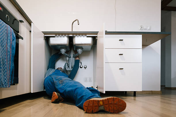 Professional Drain Cleaning technician working in Providence, RI